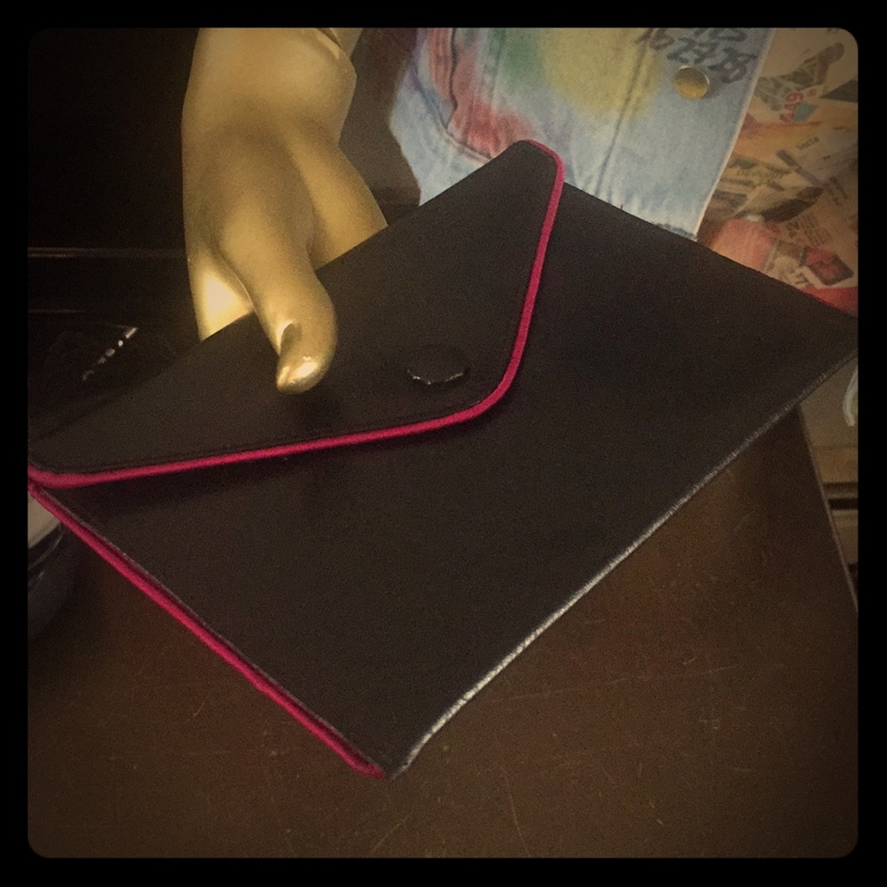 Small black leather clutch